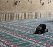 muslim man praying mosque