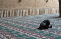 muslim man praying mosque