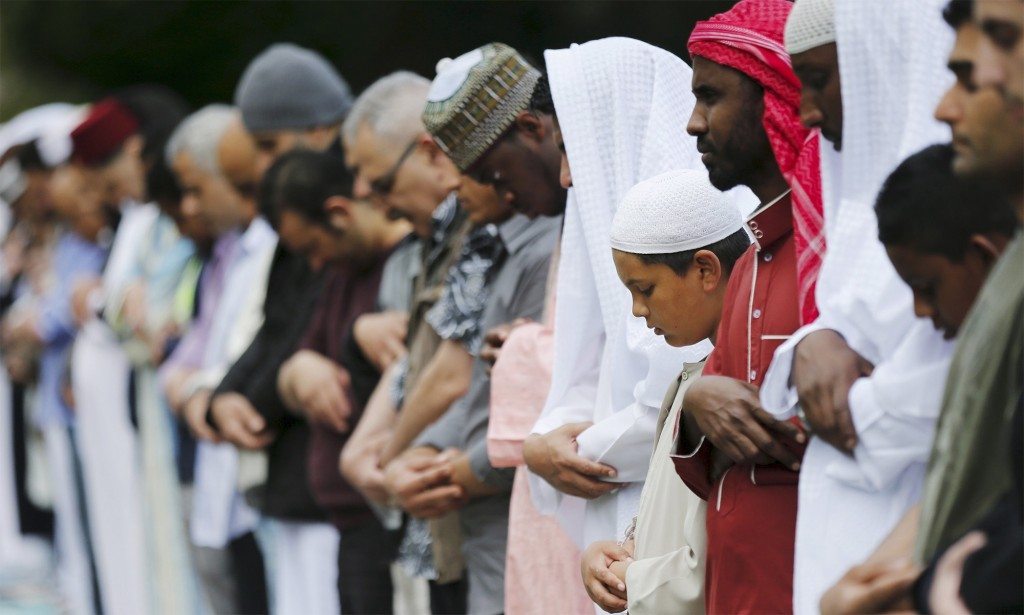 What are the factors pushing young Muslims in the UK to join groups like ISIS?